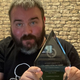 Gallagher with his award for The Nibelheim Incident